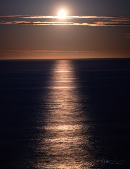 The moon sets over the Pacific Ocean: fourth in the series of an evening I spent capturing the moon as it set from Otter Rock.