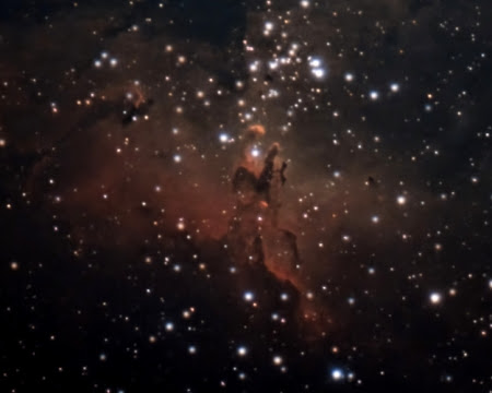 The Pillars of Creation are towering columns of gas and dust that stretch higher than multiple trips from the Sun to Pluto and back. It is the heart of the Eagle Nebula, a massive nebula that resides in an area densely populated with nebulae as you gaze into the heart of the Milky Way. This is my effort using hundreds of short, 10-second exposures.