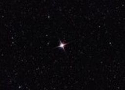 Albireo is a bright binary star system featuring a stark contrast between the primarily yellow A star and bluish secondary star.