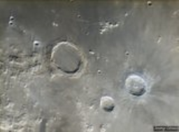 A close up of the moon showing the prominent crater Archimedes with nearby Aristillus and Autolycus.