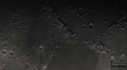 The large crater in the upper right is Archimedes. Below that, an imaginary line from Aristillus and Autolycus pointing towards the center of the image will land just north of the Apollo 15 landing site on the opposite side of the ridge. The break in the ridge is the boundary between Mare Imbrium (top) and Mare Serinitatis (bottom). The left is dominated by Mare Vaporum. The lower right craters are named Eudoxus and Aristoteles.
