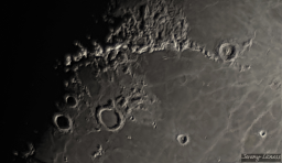 The prominent crater in the lower left is Archimedes. Apollo 15 landed 180km away. In the upper right is Cassini. It is distinct with two prominent 'sub craters' inside.