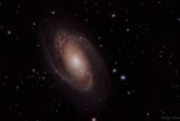 A look at Bode's Galaxy (M81) that celebrates the colorful stars and nebulae in and surrounding this grand design spiral galaxy.
