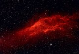 West of the Pleiades is a red streak that spans 2.5 degrees of sky. NGC1499 is the designation for an emission nebula that emits mostly in a set of narrow Hydrogen bands. Named for its distinct shape, this is the California Nebula.