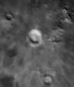 A close up of the large crater named Copernicus on the moon.