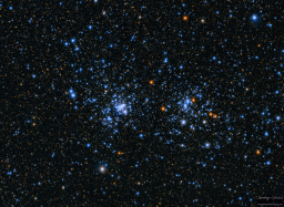 The double cluster is the beautiful pair of NGC869 (h Persei) and NGC884 (χ (chi) Persei), containing over 300 blue-white super-giant   s and a scattering of red super-giants. The cluster is also blue shifted as it inches its way 24 miles closer to earth every second. It is visible to the naked eye and lurks near the distinct W of Cassipeia.