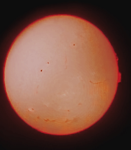 First light! I'm still working out the best way to image (this is a cellphone picture) but the Coronado PST I just received is amazing! A dedicated hydrogen-alpha solar scope and the images in real life are stunning!