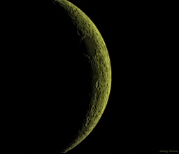 An image of the moon taken during the day that showed up green.