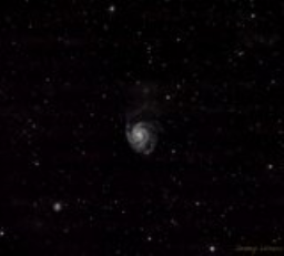 This shot of the popular M101 Pinwheel Galaxy was taken at 336mm to produce a wide field that reveals myriad neighboring galaxies.