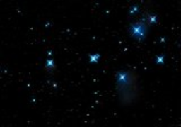 The Pleiades is one of the closest star clusters to Earth and filled with bright blue stars.