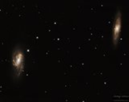 A close up of two galaxies in the Leo Triplet.