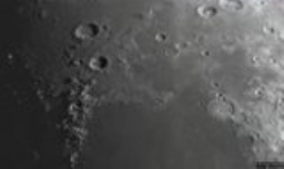 This is the north end of Mare Serenitatis. The craters above the ridge are Eudoxus and Aristoteles. Both of these craters have shattered rims with internal peaks. The one on the right with the crater-inside-the-crater is Posidonius.