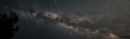 The night was so dark I could clearly see the Milky Way arching above us. I decided to take a few photographs to combine in a panorama mosaic.