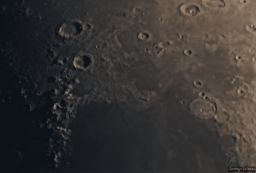 A close up of the Montes Caucasus ridge with craters Aristoteles and Eudoxus in the upper lest.