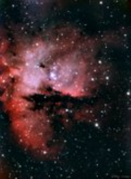 NGC281 is the designation for a cluster of high mass stars that are 'only' 6,500 light-years away. They are also elevated from the galactic plane, making for easier observation. A thick band of dark cosmic dusk creates the illusion of a gaping mouth on what is called the Pacman Nebula.
