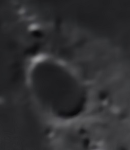 A close up of prominent crater Plato.